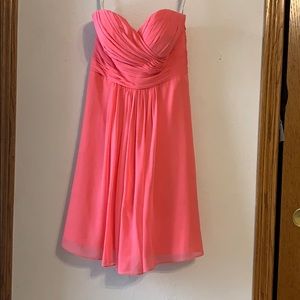 Coral strapless bridesmaid dress
